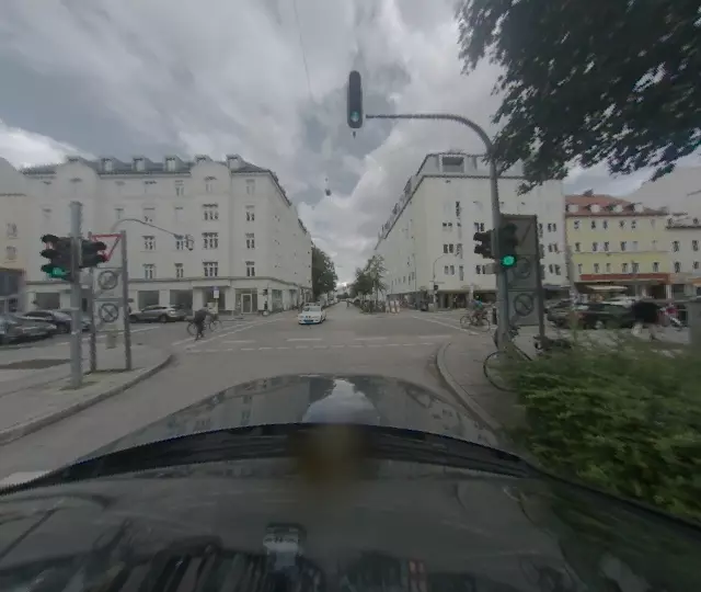 A test drive in September 2017: the camera frame and the segmentation prediction, hood included.